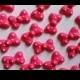 Hot pink polka dot bows -- Cupcake toppers cake decorations cake pops Minnie Mouse (12 pieces)