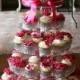 Fuchsia Wedding Cake With Cupcakes :)