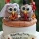 Owl cake topper with wedding arch, brick patio base and banner for names and date, autumn wedding