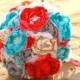 Ivory, Coral, turquoise, aqua, and grey romantic heirloom brooch wedding bouquet.