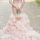 Stunning pink colored organza mermaid ruffles wedding dress