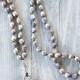 Pearl necklace with Swarovski bead and suede tassel. Swarovski necklace. Knotted pearls