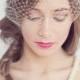 Simple tear drop hat with attached birdcage blusher veil