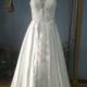 Aliexpress.com : Buy Sleeveless Sweetheart Court Train Gothic Ivory Satin Wedding Dresses from Reliable wedding dresses women suppliers on Gama Wedding Dress