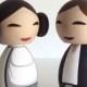 Kokeshi doll wedding cake toppers. Han and Leia