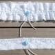 Something blue... wedding garter. White lace with a light blue rose