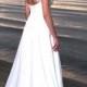 Boho Vintage Inspired A-Line Chiffon Wedding Dress with Illusion Neckline, Cap Sleeves, Lace Corset, Open Back, Long Train