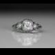 Circa 1905- Edwardian *GIA CERTIFIED* .53ct Old European Brilliant Diamond Engagement Ring in Platinum with intricate filigree work VEG#298
