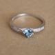 Genuine Blue Topaz Solitaire engagement ring available in sterling silver or white gold