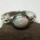 Genuine White Opal Infinity Ring Sterling Silver Bezel