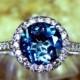 AAAA Round Natural London Blue Topaz (1.50ct) 7.00 mm in 14K white gold Halo ring with .30 carats of diamonds