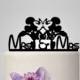 Disney cake topper with Mrs and mrs, minnie and mickey mouse