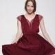Maroon dress knee length, lace cleavage and sleeves ,bell shape skirt