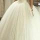 Strappy princess tulle ball gown wedding dress