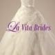 V neck tulle straps lace wedding gown with bias cut tulle skirt