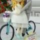Wedding Cake topper, Wedding clay couple in Las Vegas with Bicycle clay miniature, wedding clay doll, ring holder clay figurine