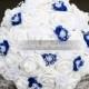 White bridal bouquet with royal blue and white pearl flowers, royal horizon blue and white pearls bouquet