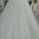 Simply strappy lace bodice tulle ball gown wedding dress