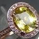 AAA Canary Yellow sapphire 2.59 carats 9x7mm in a 14k ROSE gold Halo engagement ring with diamonds (.32ct) Ring