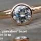 Forever Brilliant Moissanite Engagement Ring with Hybrid Peekaboo Prong Bezel - Recycled 14k Rose Gold, Diamond Alternative
