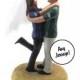 Embracing Couple in Sports Jerseys Wedding Cake Topper
