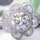 Spectacular Art Deco Vintage Flower Cluster Diamond Engagement Ring. Total Diamond Weight 1.10 Carats. Feature Diamond Stunning Quality VS1