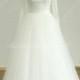 Open back long sleeved tulle lace wedding dress with deep v neckline