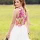 alternative wedding dress, all white with bright floral back