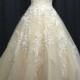 Sweetheart neck champagne colored ball gown wedding dress
