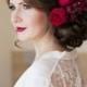 Red Flower Hairpiece Low Updo Wedding Hairstyle