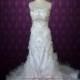 Strapless Crystal Slim A-line Wedding Dress with Tiered Rufffles and Beadwork 