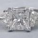 Gorgeous 5.54 ctw Princess Cut Diamond Ring with a 4.07 H Color/VS2 Clarity Enhanced Center Diamond