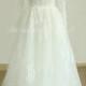 Romantic a line french lace wedding dress with keyhole back and long seelves