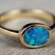 Black Opal Engagement Ring 14K Solid Gold  East to West Solitaire SKU: 7x5-E-W