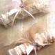 Ivory Garter Set - Satin ivory garter set with cream and ivory feathers and rhinestone jewel, wedding garters