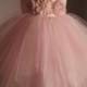 Flowergirl Dress in Multi Layer Tuille with  uneven Hem.  Fluffy and Airy with Full skirts.