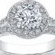 Platinum split band halo engagement ring with 1.60 ct Round White Sapphire and 0.30 ctw G-VS2 diamonds