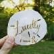 Hand lettered sand dollar escort cards, sand dollar place cards, wedding place cards, seashell wedding decoration, beach theme place cards