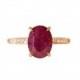 Oval Ruby Ring in 14kt Yellow Gold with diamonds