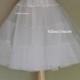 Tea Length Crinoline. Medium Fullness Petticoat. Designed specifically for our Tea Length Dresses. Available in Several Colors.