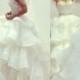 Gorgeous strapless tiered organza ball gown wedding dress