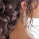 Braided Loose Curls Low Updo Wedding Hairstyle