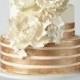 Cake With Copper Stripes And Flowers - A Glamorous Ivory Cake With Copper Stripes And Flowers
