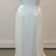Beautiful Carmela Sutera wedding dress in a light ivory color