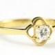 Edwardian style diamond solitaire quatrefoil engagement ring in 18 carat gold