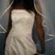 Wedding veil fingertip length 42" long with folded satin ribbon 1/4".
