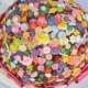 Quirky/vintage/retro, bright button bouquet with hot pink ribbon
