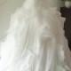 H1205 Gorgeous draped organza ball gown wedding dress