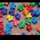 Mini rainbow royal icing flowers -- Edible cake decorations cupcake toppers (24 pieces)