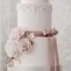 Four Tier Pink Detailed White Wedding Cake